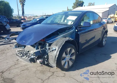 2021 Tesla Model Y Standard Range Rear-Wheel Drive from USA, damaged, VIN 5YJYGDED5MF113905